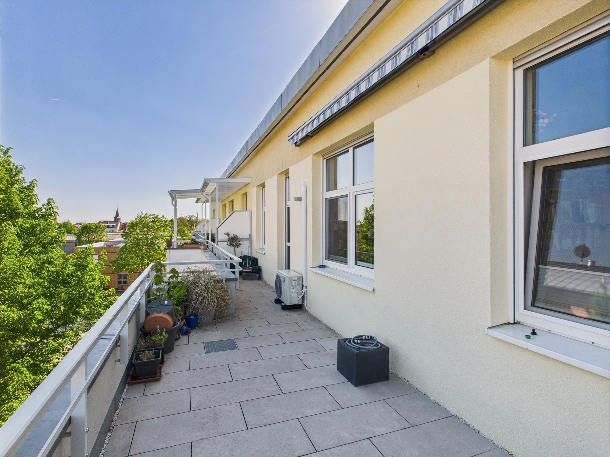 Wohnen mit Weitblick – Exklusive Terrassenwohnung mit 126 m² Außenfläche in Ilvesheim in 68549 Ilvesheim – DESEO Immobilien Mannheim 6/14